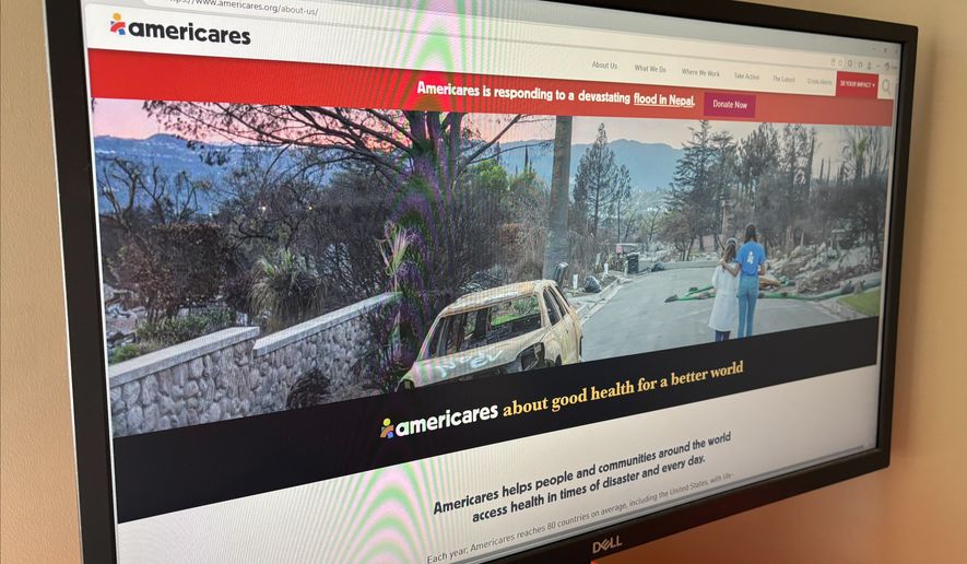 Americares' website sits open on a computer monitor in New York on Tuesday, Sept. 8, 2026. (AP Photo/James Pollard)