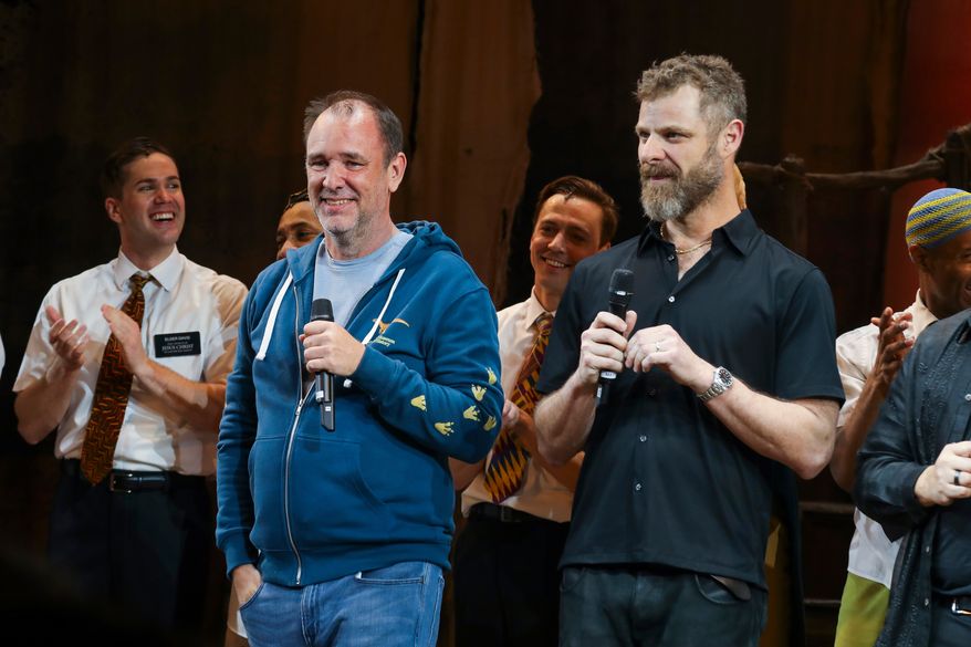 FILE - Trey Parker, left and Matt Stone, creators of the animated series "South Park," and the Broadway musical "The Book of Mormon," appear at a curtain call for the 15th anniversary performance of the musical on March 19, 2026, in New York. (Photo by Andy Kropa/Invision/AP, File)