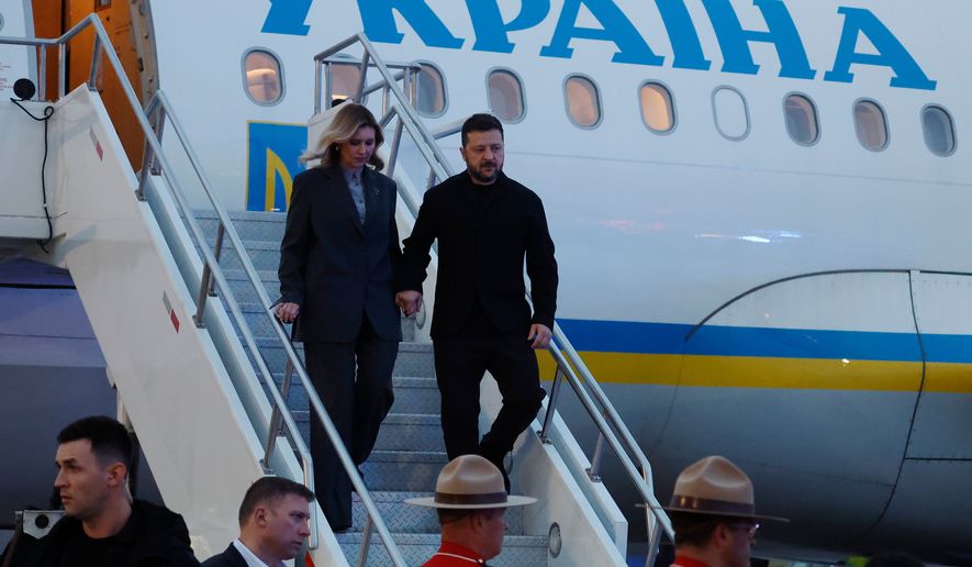President of Ukraine Volodymyr Zelenskyy and his wife Olena Zelenska arrive in Calgary, Alberta, on Wednesday, Sept. 9, 2026. (Jeff McIntosh/The Canadian Press via AP)