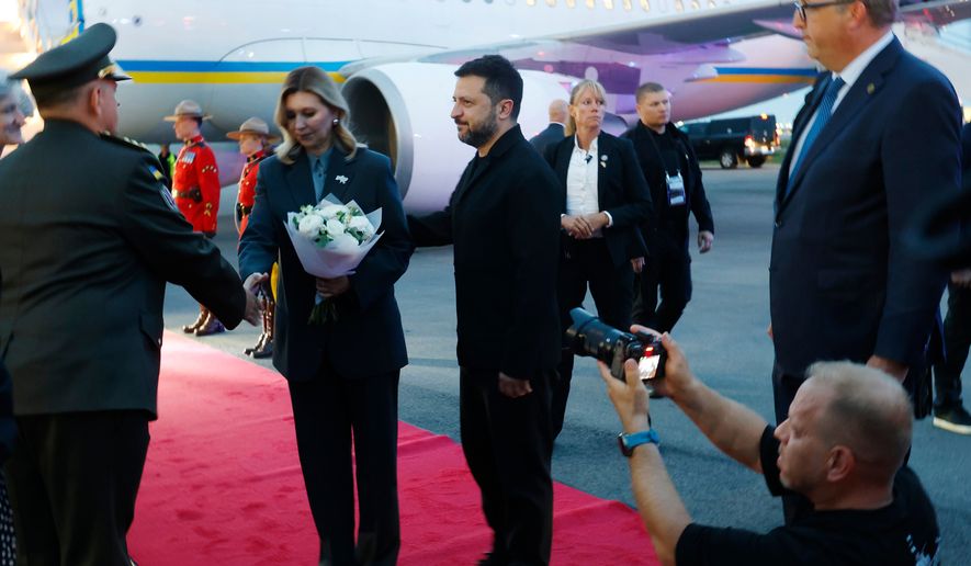 President of Ukraine Volodymyr Zelenskyy and his wife Olena Zelenska arrive in Calgary, Alberta, on Wednesday, Sept. 9, 2026. (Jeff McIntosh/The Canadian Press via AP)