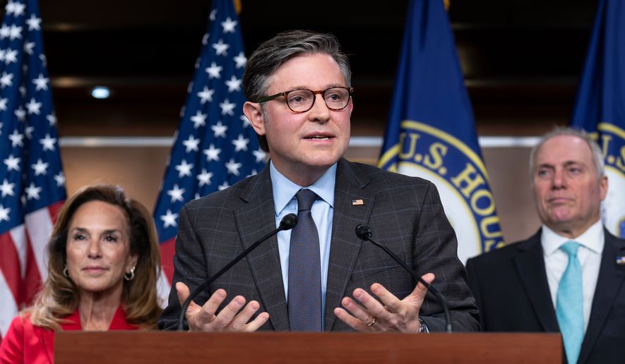 With election season getting underway, Speaker of the House Mike Johnson, R-La., center, flanked by Rep. Lisa McClain, R-Mich., left, and House Majority Leader Steve Scalise, R-La., praises the policies of President Donald Trump as he meets with reporters ahead of a vote on a stopgap funding bill and a resolution targeting socialist policies, during a news conference at the Capitol in Washington, Tuesday, Sept. 1, 2026. (AP Photo/J. Scott Applewhite)