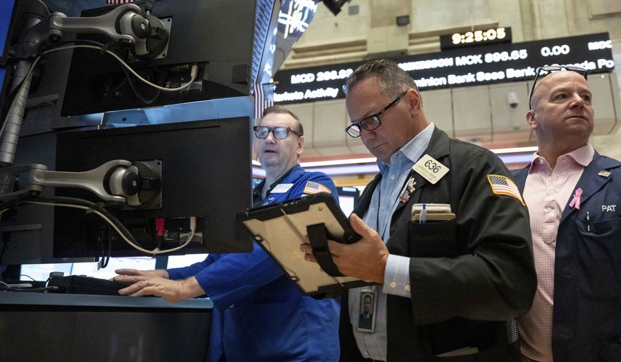 Trader Edward Curran works on the floor of the New York Stock Exchange, Thursday, Aug. 27, 2026, in New York. (AP Photo/Yuki Iwamura)