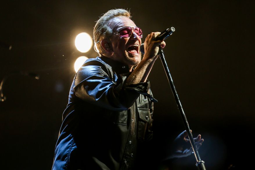 Bono of U2 performs at the Innocence + Experience Tour at The Forum in Inglewood, Calif., on May 26, 2015. (Photo by Rich Fury/Invision/AP, File)