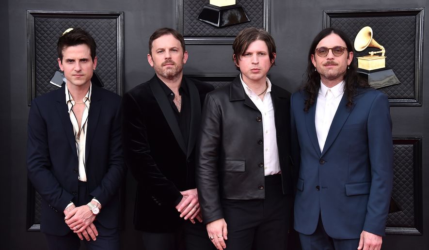 FILE - Jared Followill, from left, Caleb Followill, Matthew Followill, and Nathan Followill of Kings of Leon appear at the 64th Annual Grammy Awards in Las Vegas on April 3, 2022. (Photo by Jordan Strauss/Invision/AP, File)
