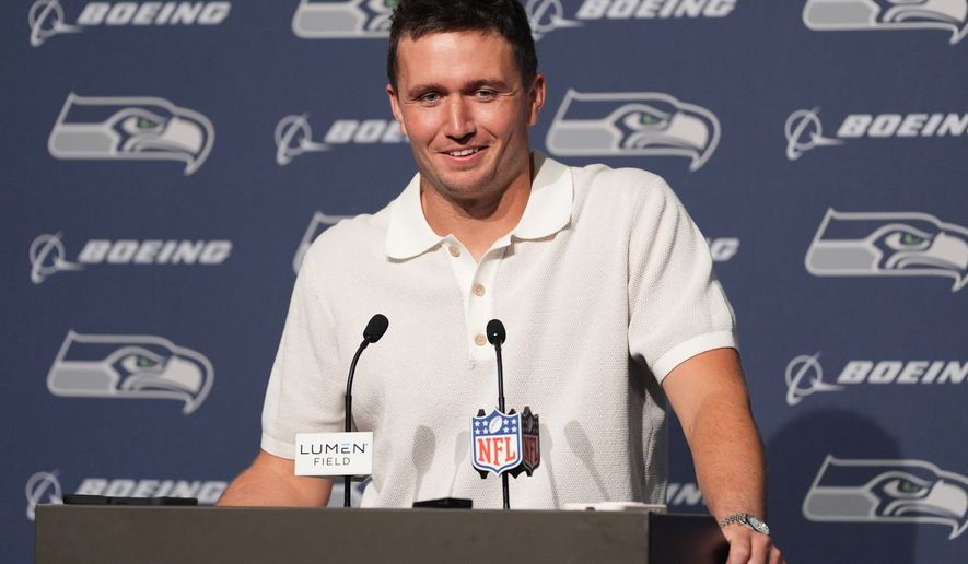 Seattle Seahawks quarterback Drew Lock speaks during a news conference after an NFL football game against the New England Patriots, Wednesday, Sept. 9, 2026, in Seattle. (AP Photo/Lindsey Wasson)