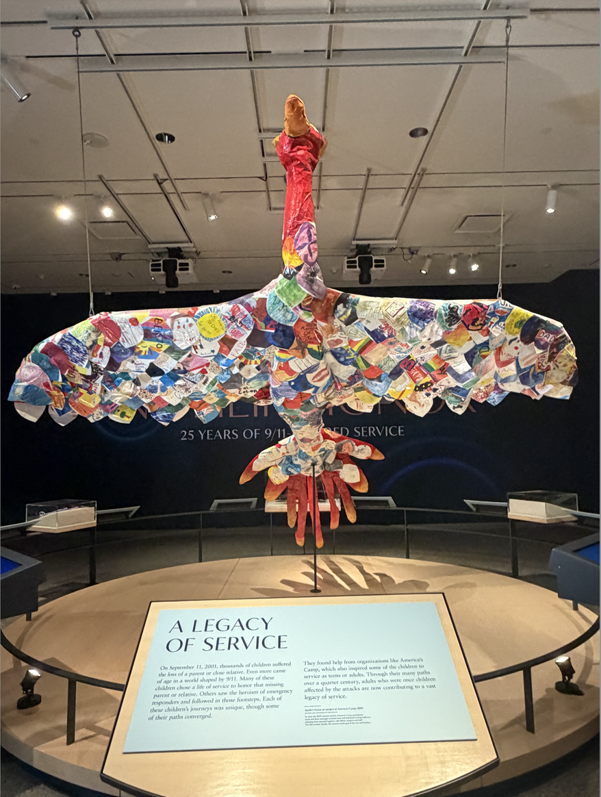 A phoenix created in 2006 by children who lost a parent or close loved one on Sept. 11, 2001, is pictured at the "In Their Honor" exhibit in New York. The artwork was made through America's Camp, a program for children who lost loved ones in the 9/11 terrorist attacks. (Juliet La Sala/The Washington Times)