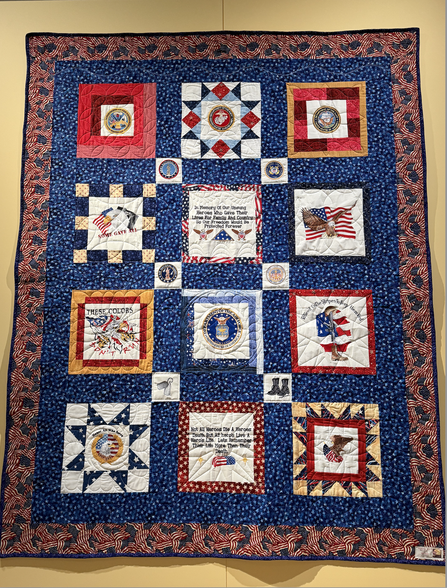 One of five memorial quilts made by Freedom Quilts, founded by Betty Nielson, a U.S. Air Force veteran. The organization creates quilts for family members of 9/11 victims and those killed in the post-9/11 wars. (Juliet La Sala/The Washington Times)