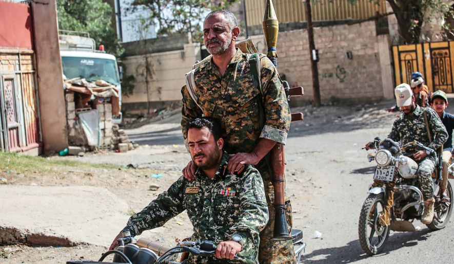 Yemen's Houthi rebels ride a motorbike during a mobilization campaign in Sanaa, Yemen, Thursday, Sept. 10, 2026. (AP Photo)