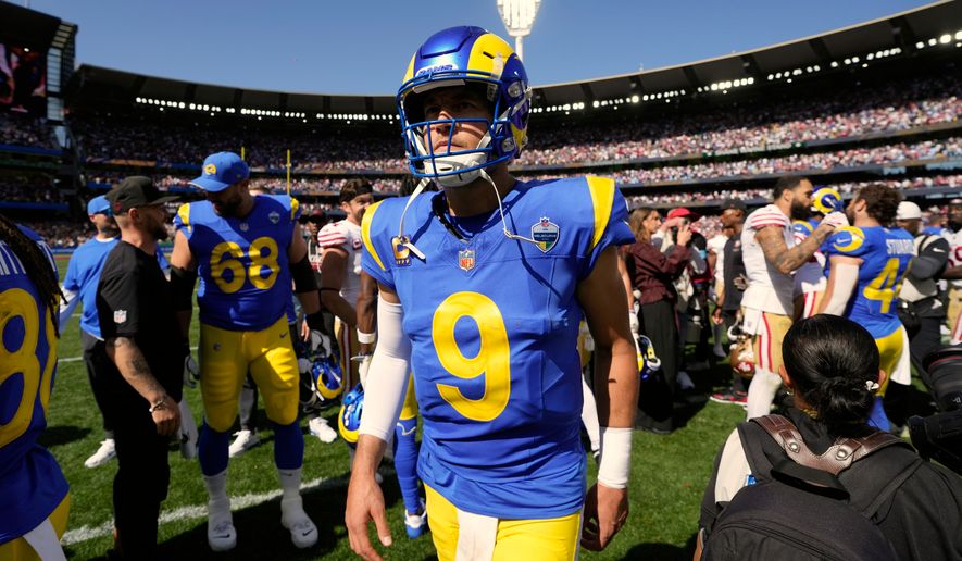 Los Angeles Rams quarterback Matthew Stafford (9) leaves the field after a loss to the San Francisco 49ers in an NFL football game in Melbourne, Australia, Friday, Sept. 11, 2026. (AP Photo/Doug Benc)
