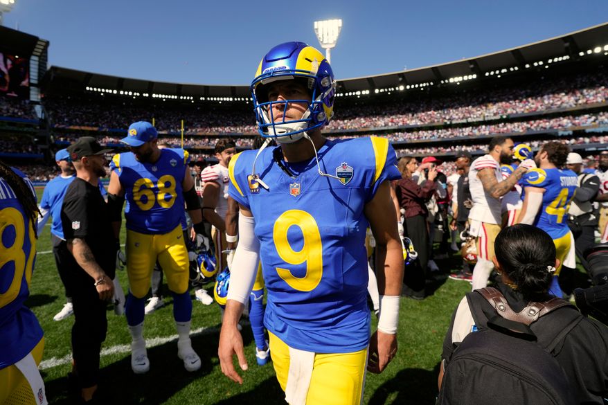 Los Angeles Rams quarterback Matthew Stafford (9) leaves the field after a loss to the San Francisco 49ers in an NFL football game in Melbourne, Australia, Friday, Sept. 11, 2026. (AP Photo/Doug Benc)