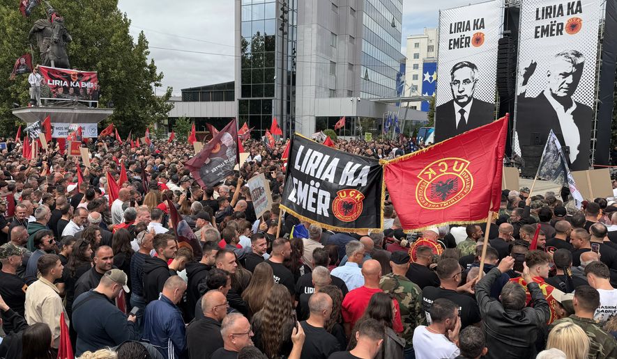 People rallied in support of a former president and three other ex-fighters ahead of their verdicts next week at a Netherlands-based court which tried them for alleged war crimes during a 1998-1999 separatist war from Serbia, in the capital Pristina, Kosovo, Saturday, Sept. 12, 2026. (AP Photo/Zana Cimili)