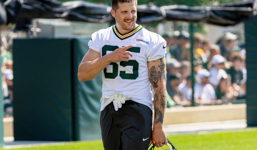 Green Bay Packers tight end Tucker Kraft points during the NFL football team's training camp, Aug. 2, 2026, in Green Bay, Wis. (AP Photo/Mike Roemer, File)