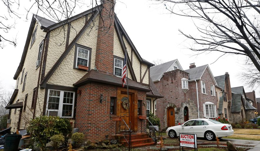 The boyhood home of President Trump is seen on Jan. 17, 2017, in New York. (AP Photo/Kathy Willens, File)