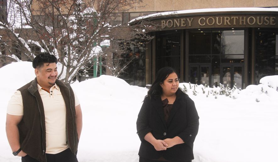 Michael Pese and his wife Tupe Smith stand outside the Boney Courthouse in Anchorage, Alaska, on Jan. 15, 2026. (AP Photo/Mark Thiessen, File)