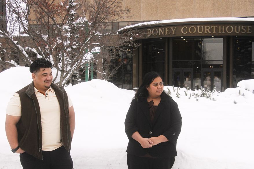 Michael Pese and his wife Tupe Smith stand outside the Boney Courthouse in Anchorage, Alaska, on Jan. 15, 2026. (AP Photo/Mark Thiessen, File)