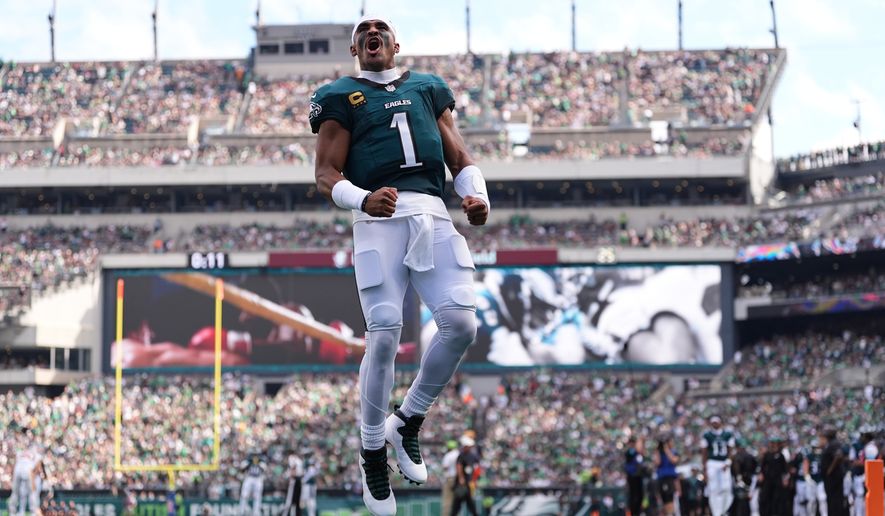 Philadelphia Eagles quarterback Jalen Hurts (1) takes the field for an NFL football game against the Washington Commanders, Sunday, Sept. 13, 2026, in Philadelphia. (AP Photo/Matt Rourke)