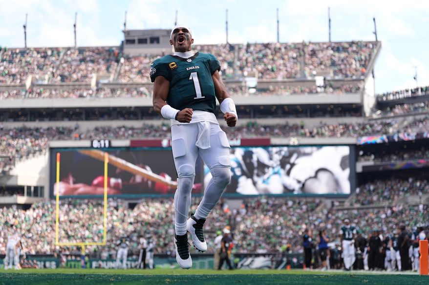 Philadelphia Eagles quarterback Jalen Hurts (1) takes the field for an NFL football game against the Washington Commanders, Sunday, Sept. 13, 2026, in Philadelphia. (AP Photo/Matt Rourke)
