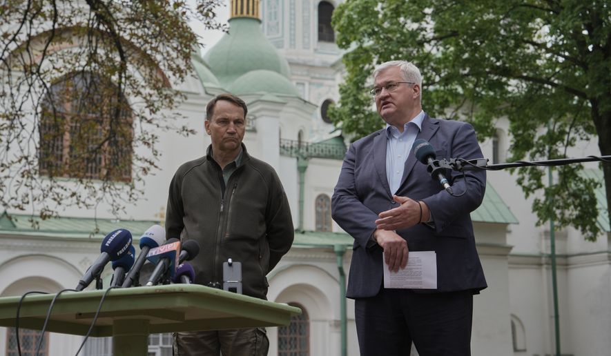 Ukrainian Foreign Minister Andrii Sybiha, right, speaks during a joint news conference with Poland's Foreign Minister Radoslaw Sikorski in Kyiv, Ukraine, Sunday, Sept. 13, 2026. (AP Photo)