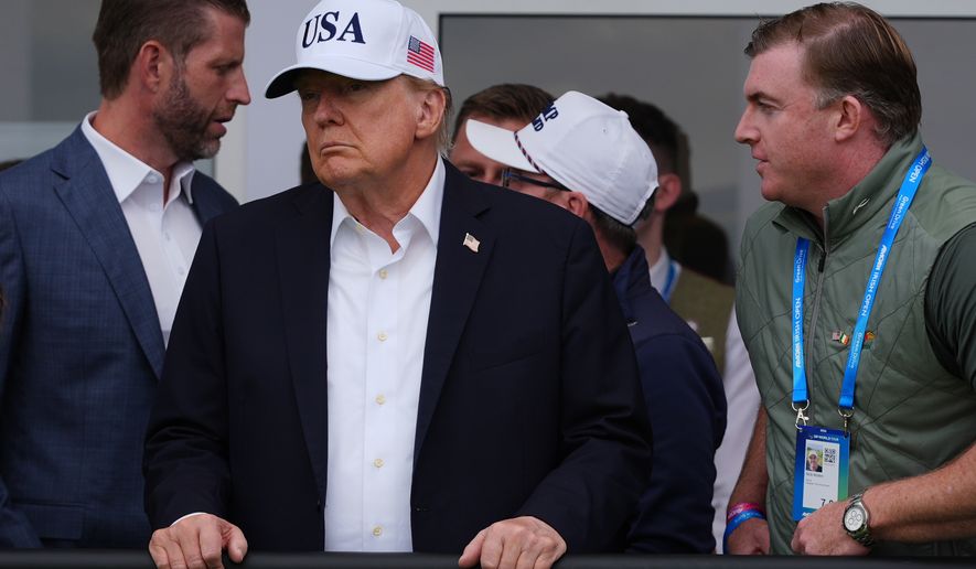 President Donald Trump watches as Shane Lowry from Ireland wins the Irish Open golf tournament at Trump International Golf Links Ireland, Sunday, Sept. 13, 2026, in Doonbeg, Ireland. (AP Photo/Julia Demaree Nikhinson)