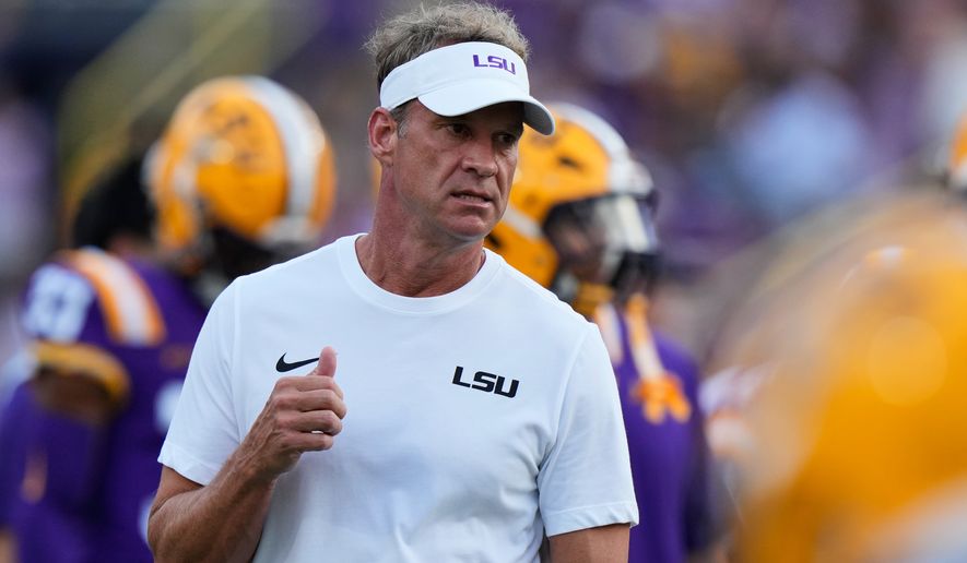 LSU head coach Lane Kiffin walks on the field before an NCAA college football game against Louisiana Tech, Saturday, Sept. 12, 2026 in Baton Rouge, La. (AP Photo/Gerald Herbert)