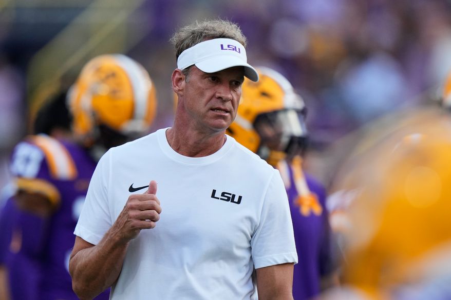 LSU head coach Lane Kiffin walks on the field before an NCAA college football game against Louisiana Tech, Saturday, Sept. 12, 2026 in Baton Rouge, La. (AP Photo/Gerald Herbert)
