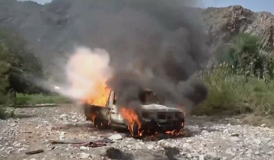 This image taken from undated video released by the Ansar Allah Media Office, the media arm of Yemen's Houthi rebels, on Saturday, Sept. 12, 2026, shows a vehicle burning during what the group says was an advance by Houthi fighters against Saudi-backed forces at an undisclosed location in southern Yemen. (Ansar Allah Media Office via AP)
