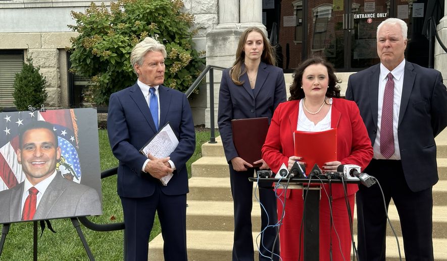 This photo taken with a smartphone shows attorney Erin N. Vernon speaking with reporters Monday, Sept. 14, 2026, at the Cole County Courthouse in Jefferson City, Mo. (AP Photo/David A. Lieb)