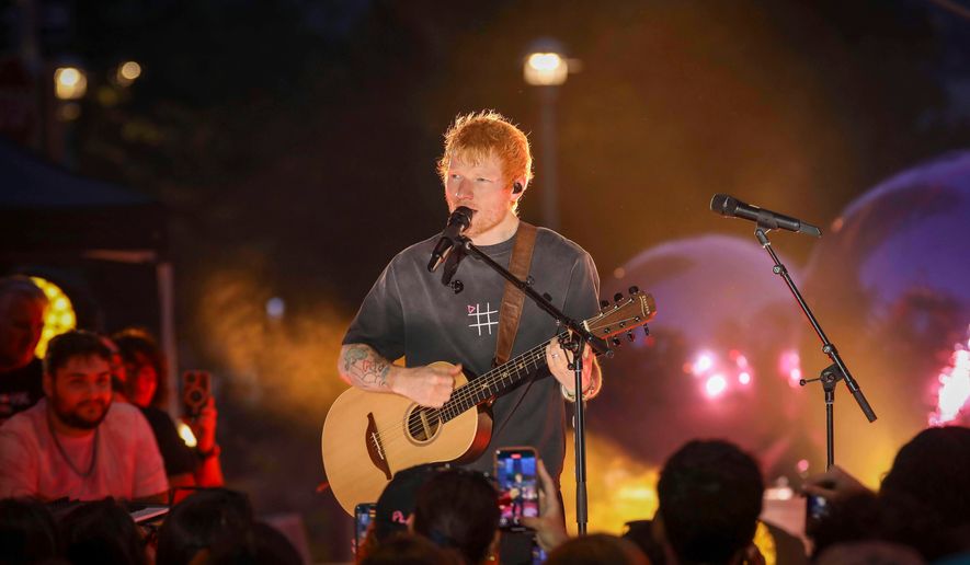 Singer-songwriter Ed Sheeran performs during "Ed Sheeran's Play: Live from New York" presented by TikTok at Domino Square in the Brooklyn borough of New York, Sept. 13, 2025. (Photo by Andy Kropa/Invision/AP, File)