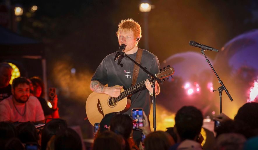 FILE - Singer-songwriter Ed Sheeran performs during "Ed Sheeran's Play: Live from New York" presented by TikTok at Domino Square in the Brooklyn borough of New York, Sept. 13, 2025. (Photo by Andy Kropa/Invision/AP, File)