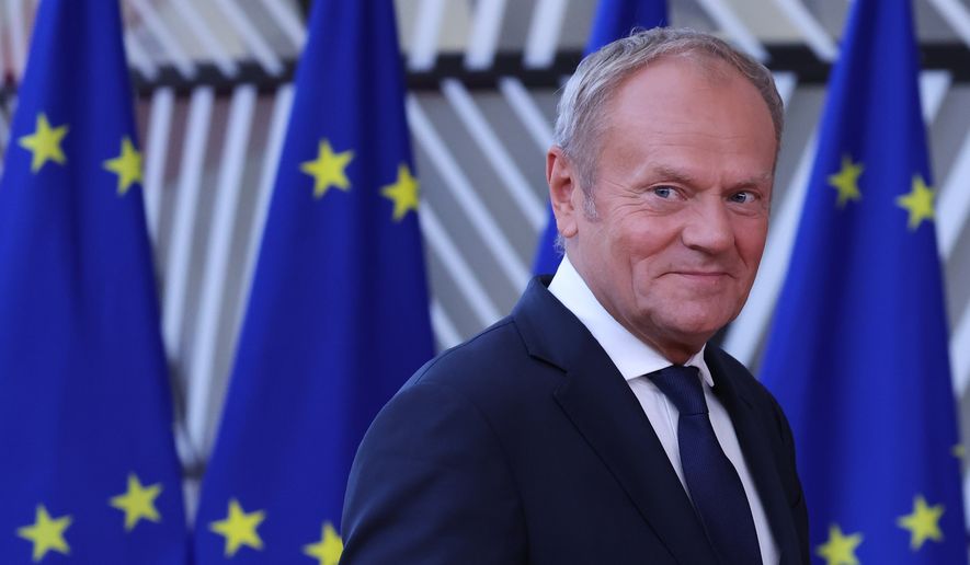 Poland's Prime Minister Donald Tusk arrives for the EU summit in Brussels on Thursday, June 18, 2026. (AP Photo/Omar Havana, File)
