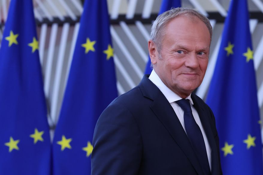 Poland's Prime Minister Donald Tusk arrives for the EU summit in Brussels on Thursday, June 18, 2026. (AP Photo/Omar Havana, File)