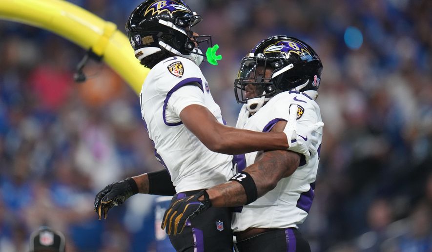 Baltimore Ravens' Derrick Henry celebrates his touchdown run with Ja'kobi Lane during the first half of an NFL football game against the Indianapolis Colts Sunday, Sept. 13, 2026, in Indianapolis. (AP Photo/Jeff Roberson)