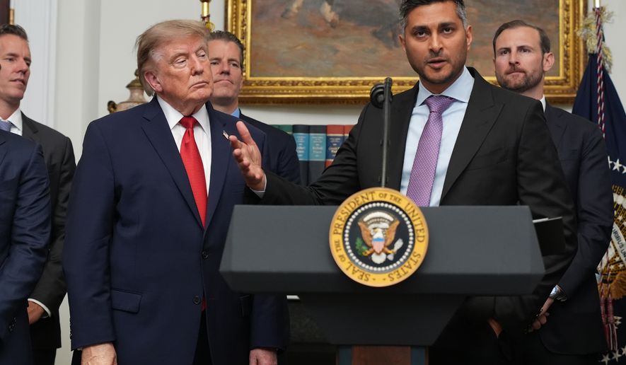 FILE - Kraken co-CEO Arjun Sethi speaks as President Donald Trump listens during a meeting with technology leaders in the Roosevelt Room of the White House, Aug. 19, 2026, in Washington. (AP Photo/Jacquelyn Martin, File)