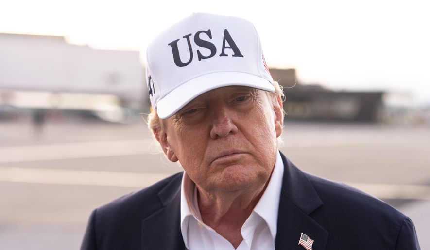 President Donald Trump speaks with reporters before boarding Air Force One at Shannon Airport, Sunday, Sept. 13, 2026, in Shannon, Ireland. (AP Photo/Julia Demaree Nikhinson)