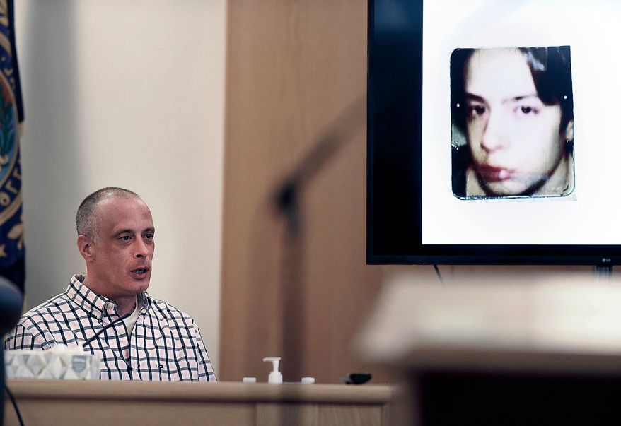 Youth Development Center plaintiff David Meehan testifies as his intake photo, when he was 14 is displayed during his civil trial at Rockingham County Superior Court in Brentwood, N.H. on April 17, 2024. (David Lane/Union Leader via AP, Pool, file)