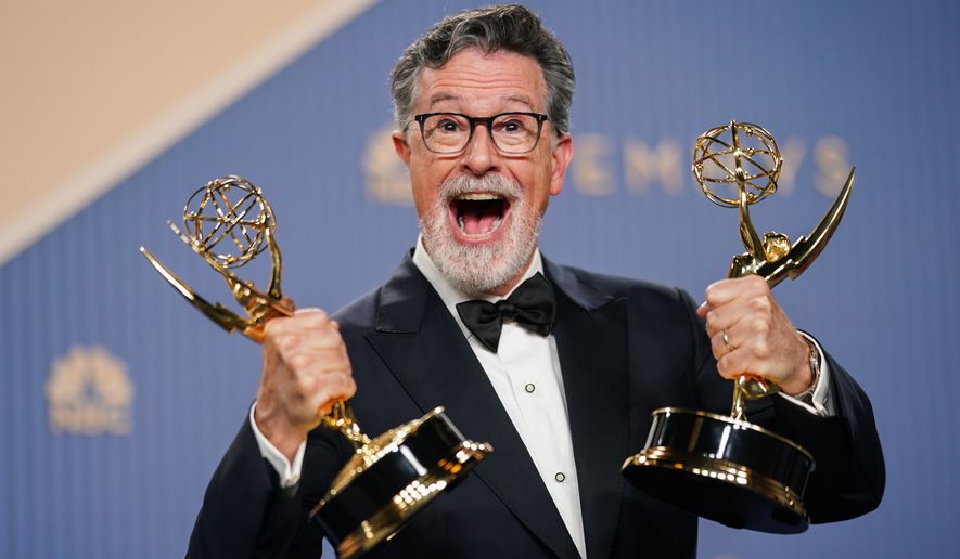 Stephen Colbert poses in the press room with the award for outstanding variety series for "The Late Show with Stephen Colbert" during the 78th Emmy Awards on Monday, Sept. 14, 2026, at the JW Marriott in Los Angeles. (Photo by Richard Shotwell/Invision/AP)