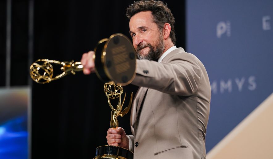 Noah Wyle poses in the press room with the awards for outstanding lead actor in a drama series for "The Pitt" and outstanding drama series for "The Pitt" during the 78th Emmy Awards on Monday, Sept. 14, 2026, at the JW Marriott in Los Angeles. (Photo by Richard Shotwell/Invision/AP)