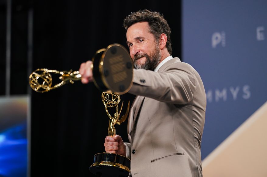 Noah Wyle poses in the press room with the awards for outstanding lead actor in a drama series for "The Pitt" and outstanding drama series for "The Pitt" during the 78th Emmy Awards on Monday, Sept. 14, 2026, at the JW Marriott in Los Angeles. (Photo by Richard Shotwell/Invision/AP)