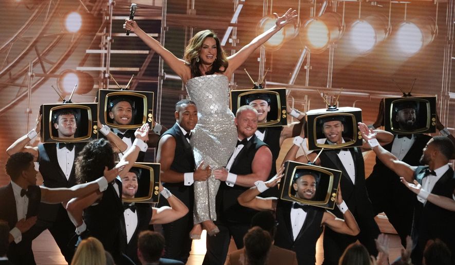Host Mariska Hargitay, center, performs during the 78th Emmy Awards on Monday, Sept. 14, 2026, at the Peacock Theater in Los Angeles. (AP Photo/Chris Pizzello)