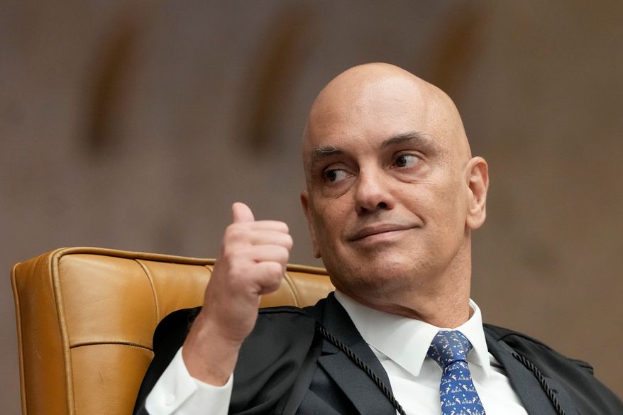 Supreme Court Justice Alexandre de Moraes gives a thumbs-up during a plenary session of the court in Brasilia, Brazil, Wednesday, Sept. 2, 2026. (AP Photo/Eraldo Peres)