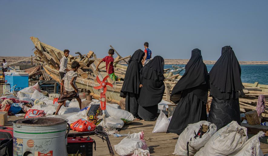 This photo released by the International Organization for Migration (IOM) shows displaced Yemenis arriving to Obock, Djibouti, after they crossed the Bab el-Mandeb Strait from Yemen, Sunday, Sept. 13, 2026. (Mylaèle Negga/IOM via AP)
