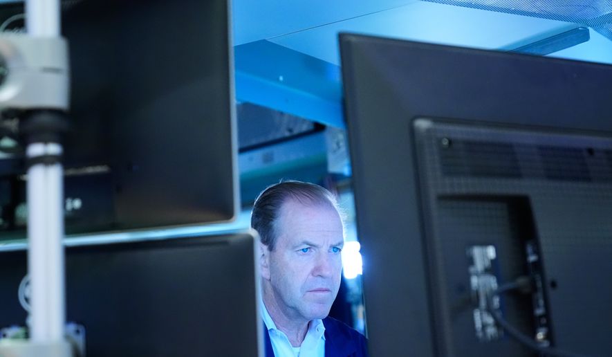 Michael Smyth works on the floor at the New York Stock Exchange in New York, Monday, Sept. 14, 2026. (AP Photo/Seth Wenig)