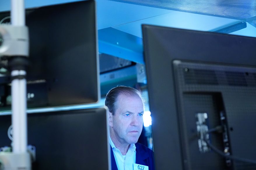 Michael Smyth works on the floor at the New York Stock Exchange in New York, Monday, Sept. 14, 2026. (AP Photo/Seth Wenig)