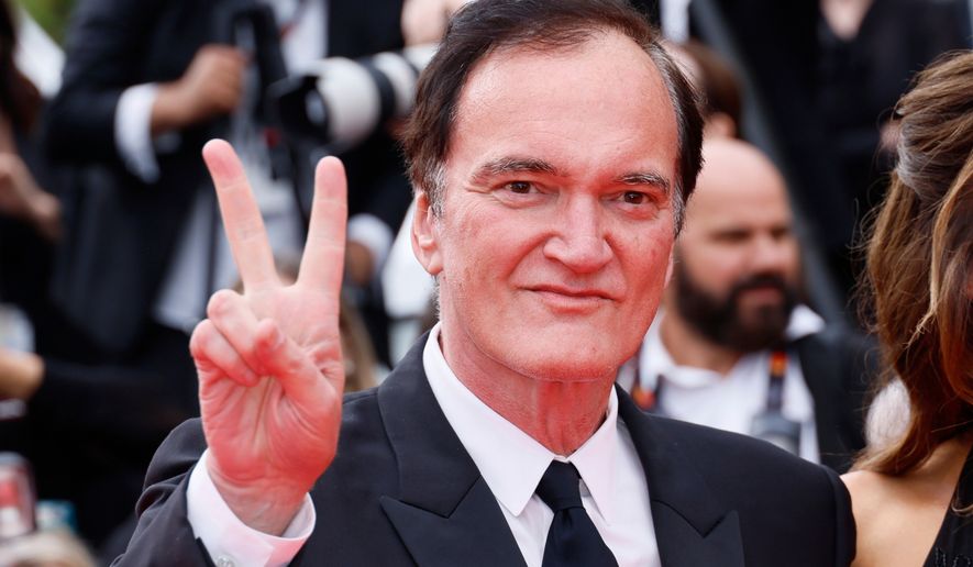 FILE - Quentin Tarantino poses for photographers upon arrival at the premiere of the film 'Nouvelle Vague' at the 78th international film festival, Cannes, southern France, Saturday, May 17, 2025. (Photo by Joel C Ryan/Invision/AP, File)