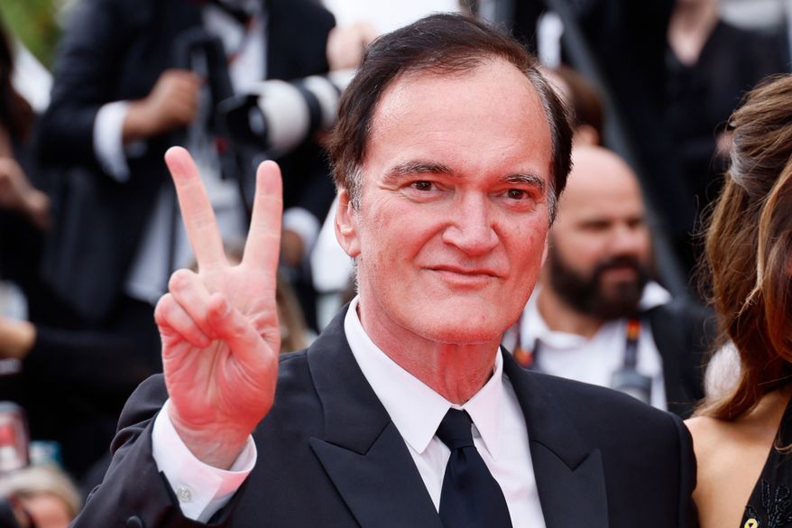 FILE - Quentin Tarantino poses for photographers upon arrival at the premiere of the film 'Nouvelle Vague' at the 78th international film festival, Cannes, southern France, Saturday, May 17, 2025. (Photo by Joel C Ryan/Invision/AP, File)