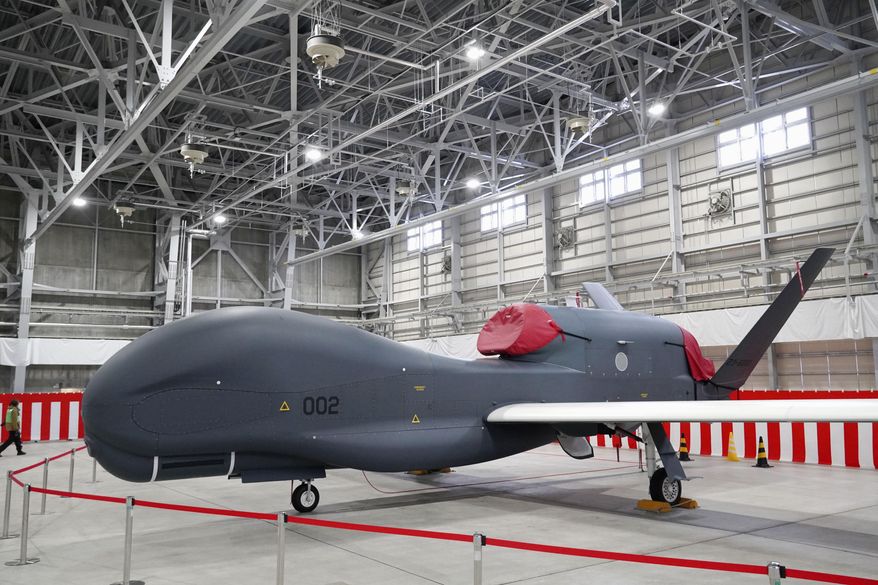 A Global Hawk, long-distance surveillance drone of the Japan Air Self-Defense Force, is shown to the media at its base in Misawa, Aomori prefecture, on Jan., 2023. (Kyodo News via AP)