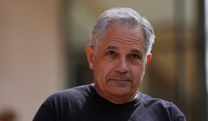 Philadelphia District Attorney Larry Krasner joins immigrant rights supporters as they demonstrate during a May Day rally outside the federal courthouse in Philadelphia, May 1, 2025. (AP Photo/Matt Rourke, File)