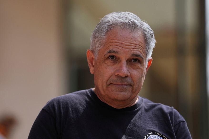 Philadelphia District Attorney Larry Krasner joins immigrant rights supporters as they demonstrate during a May Day rally outside the federal courthouse in Philadelphia, May 1, 2025. (AP Photo/Matt Rourke, File)