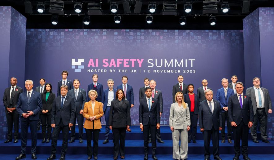 First row, from left, France's Minister for Economy, Finance, Industry and Digital Security Bruno Le Maire; German Economy and Climate Minister Robert Habeck, European Commission President Ursula von der Leyen, U.S. Vice President Kamala Harris, British Prime Minister Rishi Sunak, Italian Prime Minister Giorgia Meloni, U.N. Secretary General Antonio Guterres and Australian Deputy Prime Minister and Minister of Defense Richard Marles, middle and back row, from left, Google's James Manyika, President of the Carnegie Endowment for International Peace Tino Cuellar, AI Now Institute's Amba Kak, Mistral AI CEO Arthur Mensch, CEO of Amazon Web Services Adam Selipsky, Meta's Nick Clegg, Quebec AI Institute's Yoshua Bengio, Anthropic's Dario Amodei, OpenAI's Sam Altman, Microsoft's Brad Smith, Inflection AI Co-Founder Mustafa Suleyman, former acting director of the White House Office of Science and Technology Policy Alondra Nelson, Google DeepMind's Demis Hassabis, Schmidt Futures Founder Eric Schmidt, Chair of UK Frontier AI Taskforce Ian Hogarth and Inflection AI's Reid Hoffman pose for a group photo on the second day of the UK Artificial Intelligence Safety Summit at Bletchley Park, in Bletchley, England, on Nov. 2, 2023. (Toby Melville/Pool Photo via AP, File)