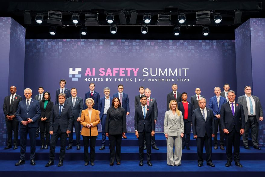 First row, from left, France's Minister for Economy, Finance, Industry and Digital Security Bruno Le Maire; German Economy and Climate Minister Robert Habeck, European Commission President Ursula von der Leyen, U.S. Vice President Kamala Harris, British Prime Minister Rishi Sunak, Italian Prime Minister Giorgia Meloni, U.N. Secretary General Antonio Guterres and Australian Deputy Prime Minister and Minister of Defense Richard Marles, middle and back row, from left, Google's James Manyika, President of the Carnegie Endowment for International Peace Tino Cuellar, AI Now Institute's Amba Kak, Mistral AI CEO Arthur Mensch, CEO of Amazon Web Services Adam Selipsky, Meta's Nick Clegg, Quebec AI Institute's Yoshua Bengio, Anthropic's Dario Amodei, OpenAI's Sam Altman, Microsoft's Brad Smith, Inflection AI Co-Founder Mustafa Suleyman, former acting director of the White House Office of Science and Technology Policy Alondra Nelson, Google DeepMind's Demis Hassabis, Schmidt Futures Founder Eric Schmidt, Chair of UK Frontier AI Taskforce Ian Hogarth and Inflection AI's Reid Hoffman pose for a group photo on the second day of the UK Artificial Intelligence Safety Summit at Bletchley Park, in Bletchley, England, on Nov. 2, 2023. (Toby Melville/Pool Photo via AP, File)